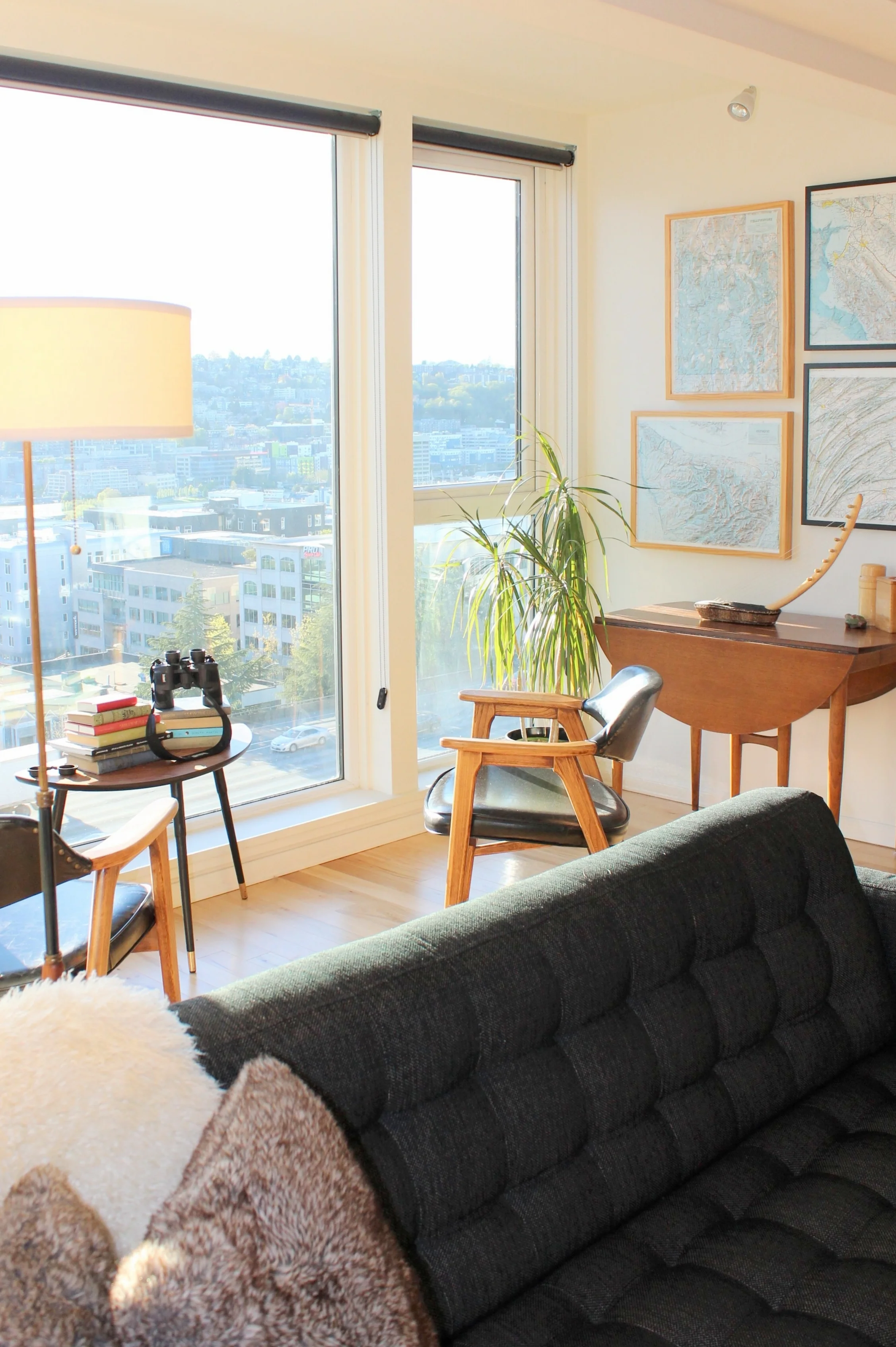 The view of South Lake Union and downtown Seattle is gorgeous! The afternoon light fills the warm, mid-century inspired space. 