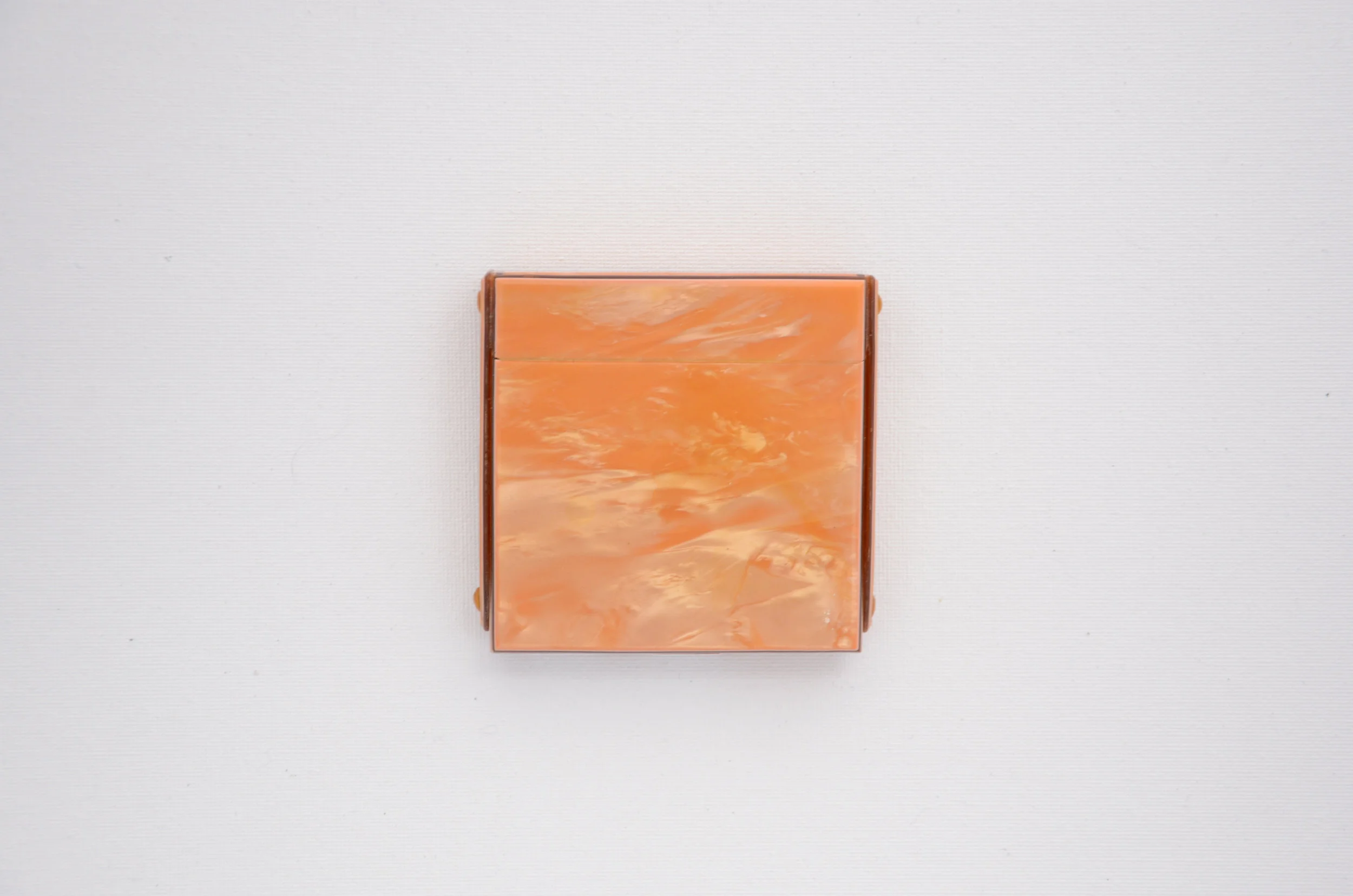 1920's Pale Orange Bakelite Container