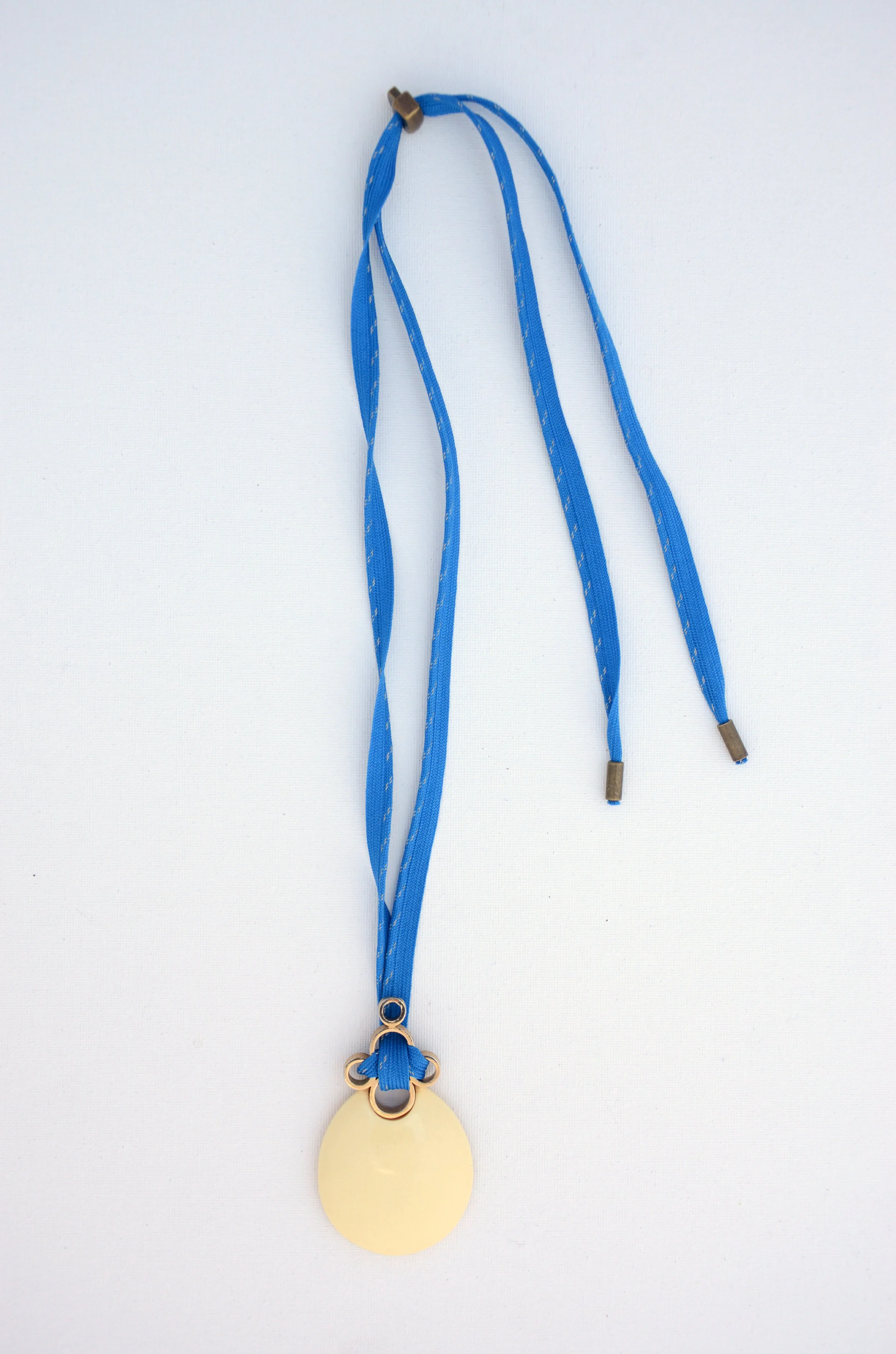 1970's Kenneth Jay Lane Cream/Goldtone Resin Pendant and Modern Sport Cord, Adjustable Length