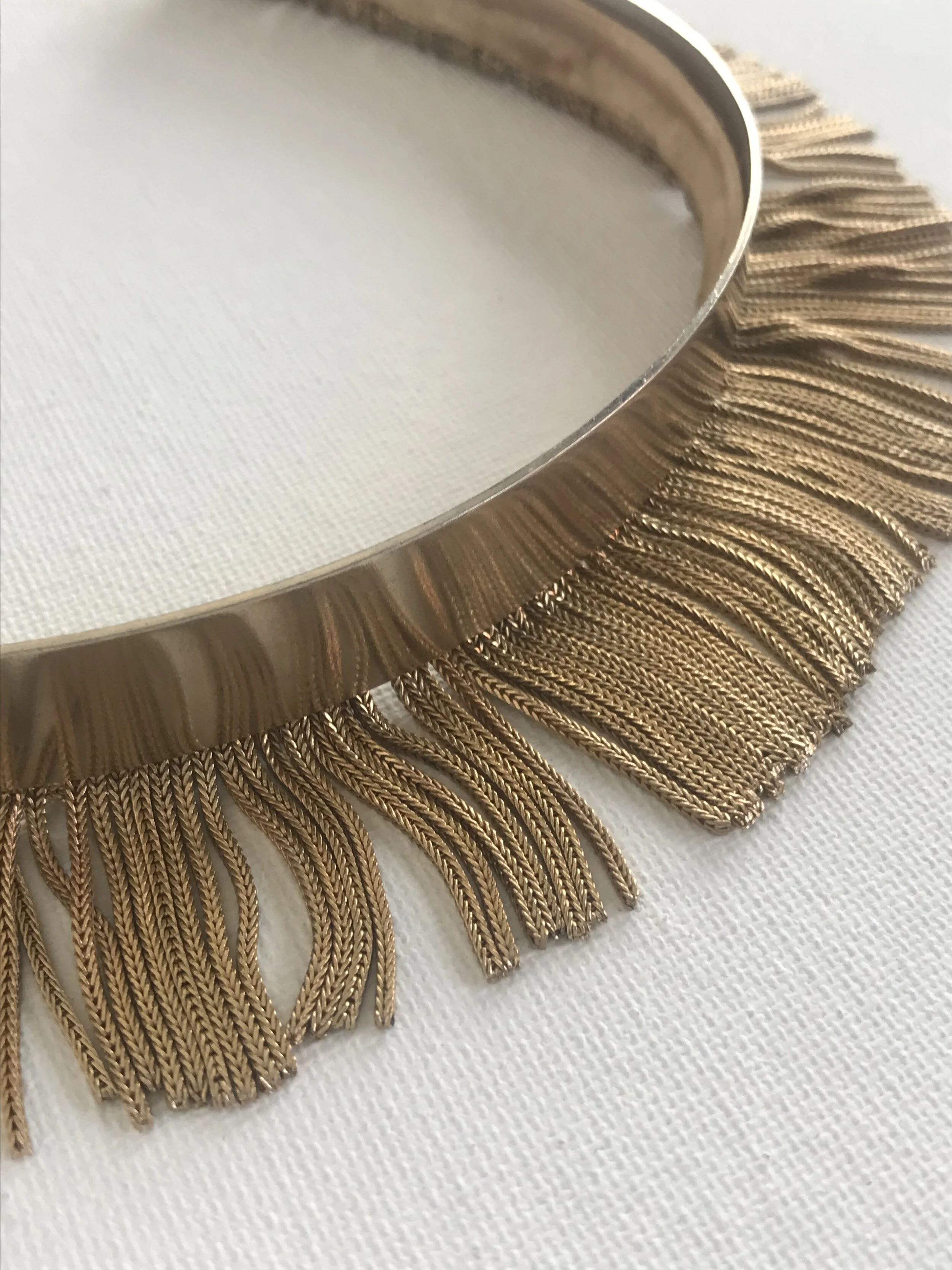 Detailed View of 1960's Gold Fringe Headband
