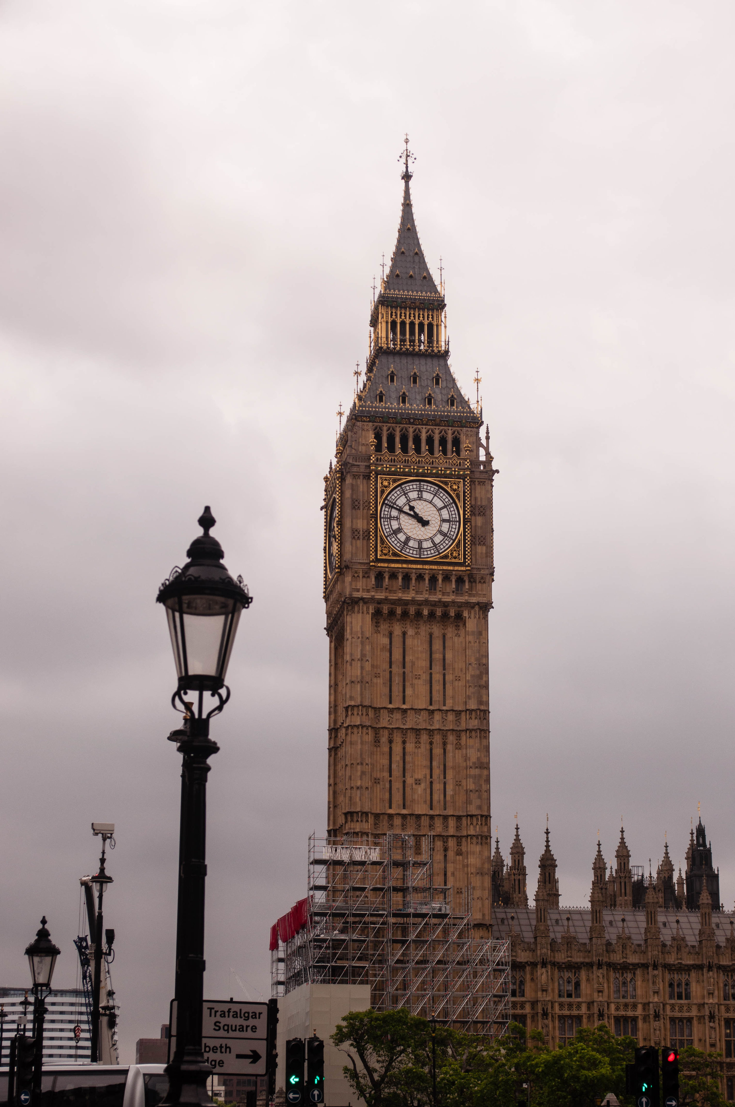Big Ben in London and lamp post. This landmark can be seeing during a long layover in London (UK)