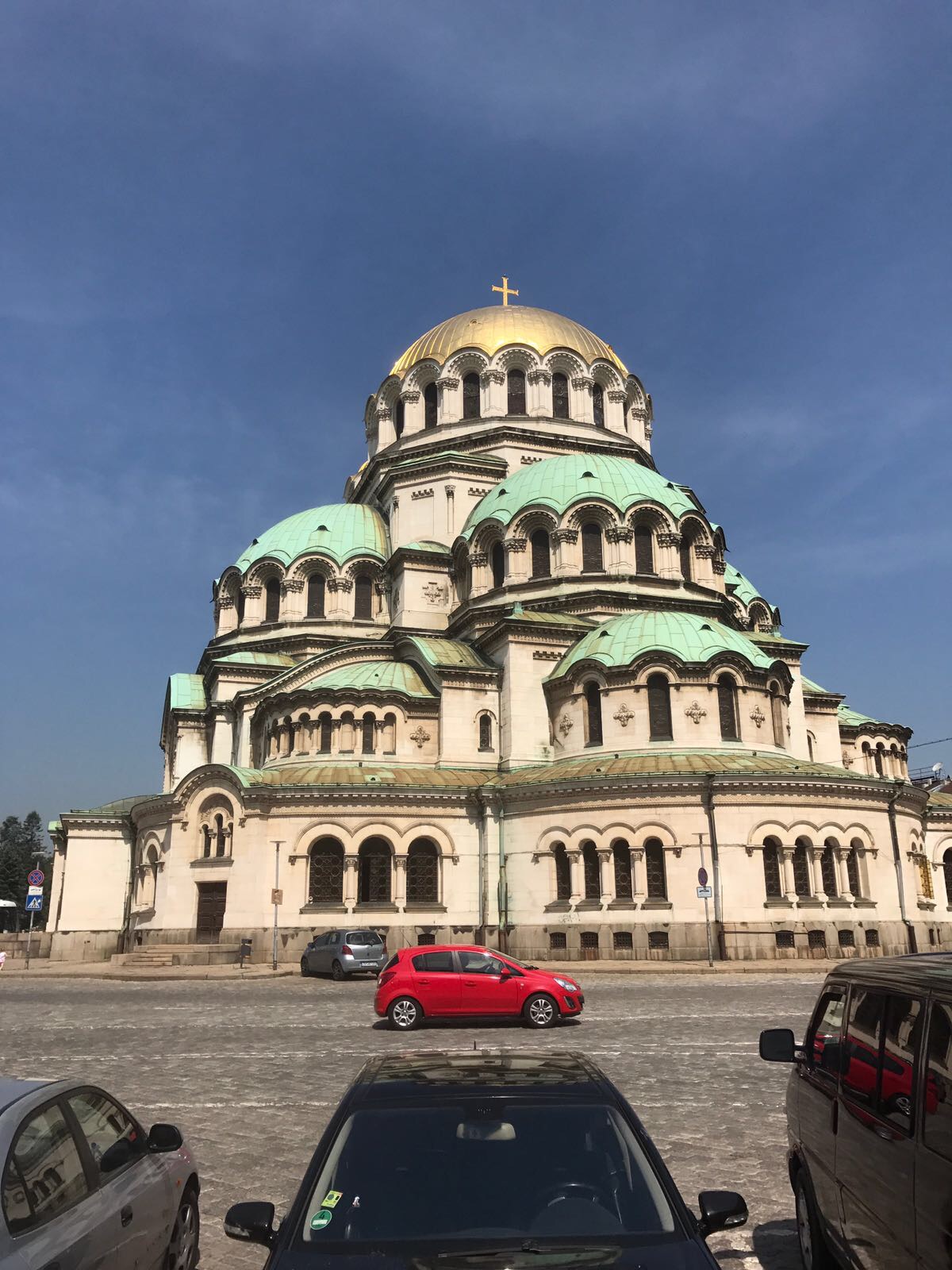 Sofia itinerary, Alexander Nevsky Cathedral in Sofia (Bulgaria) with a red car in the foreground