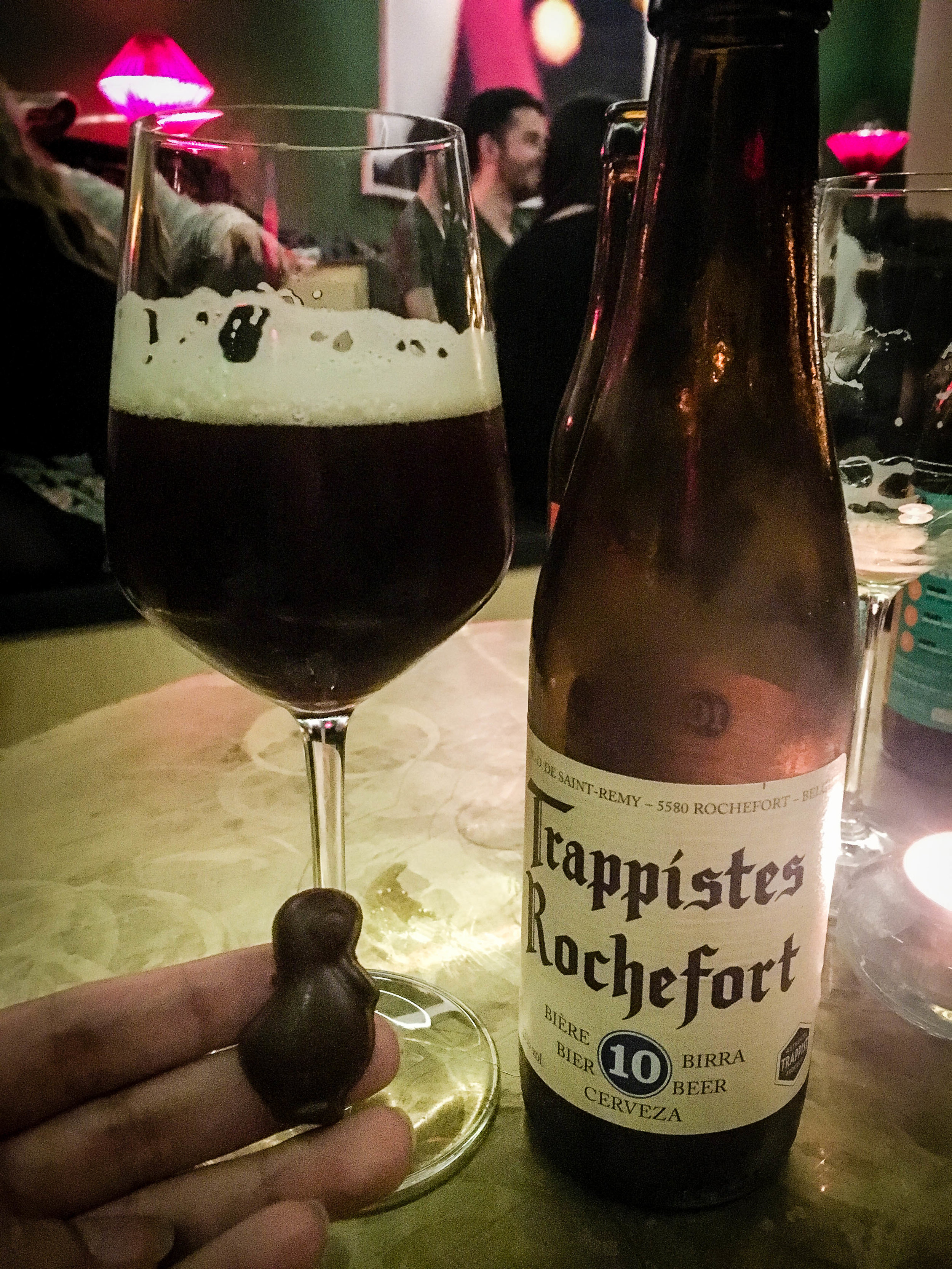 Trapiste Rochefort a Belgian beer tasting a a dark chocolate praline during our Brussels Beer and Chocolate Tour given by Brussels Journey