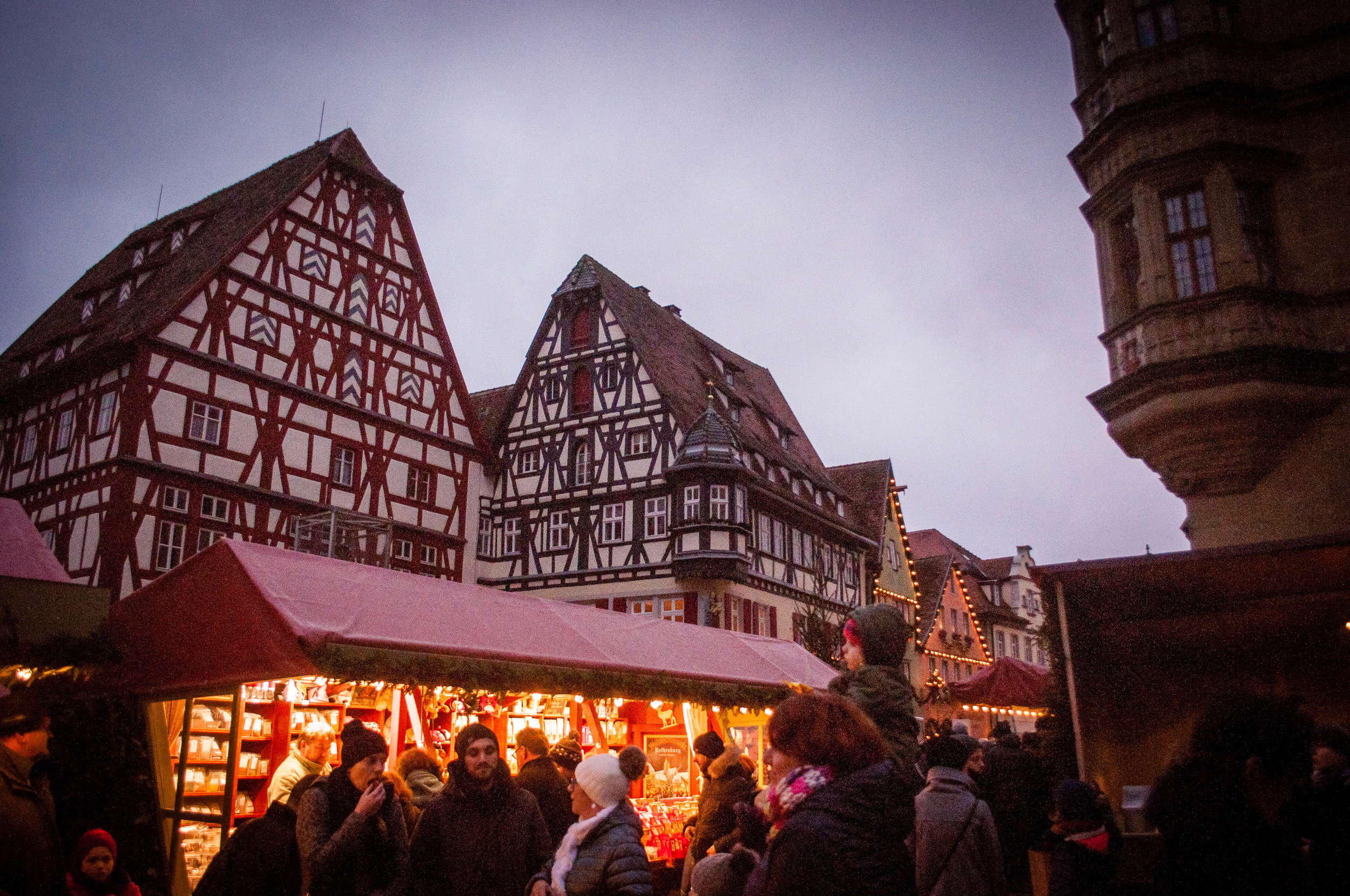 things to do in Rothenburg ob der Tauber. Rothenburg ob der Tauber medieval buildings with the Christmas markets stands 