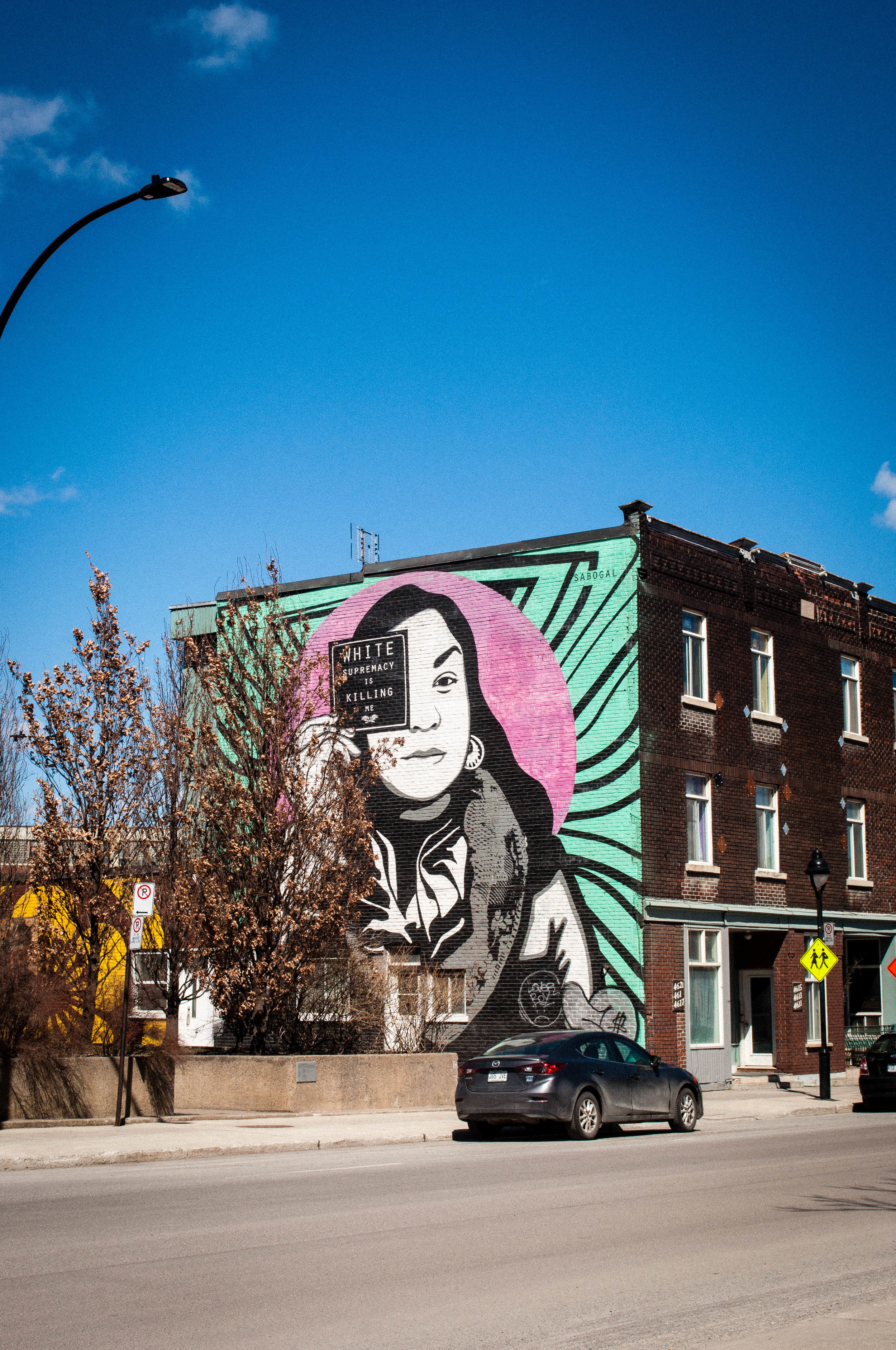 Montreal street art -Mural in Saint-Henri by a Native American Artist, Jessica Sabogal. Graffiti proposed as the best street art in Montreal