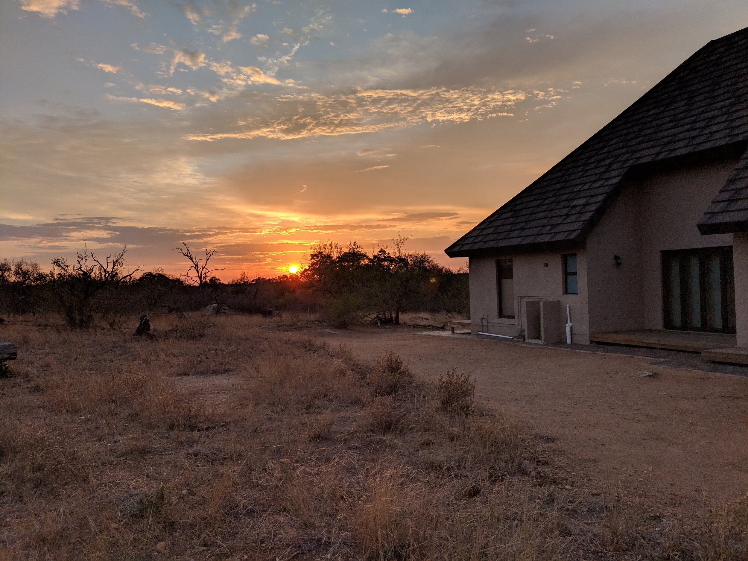 Sunset at a safari private lodge. safari planner