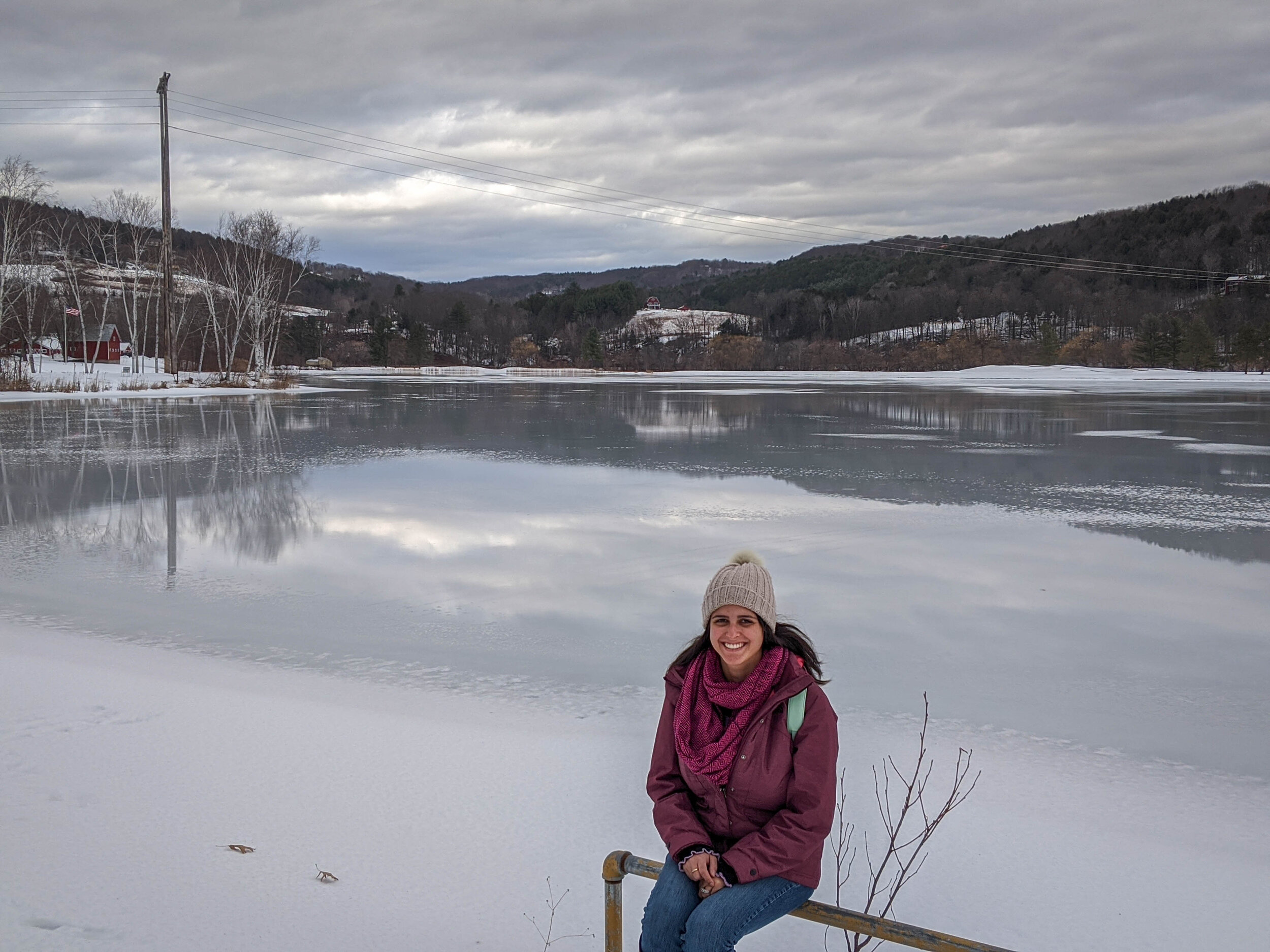 Latine girl in a frozen lake in Vermont