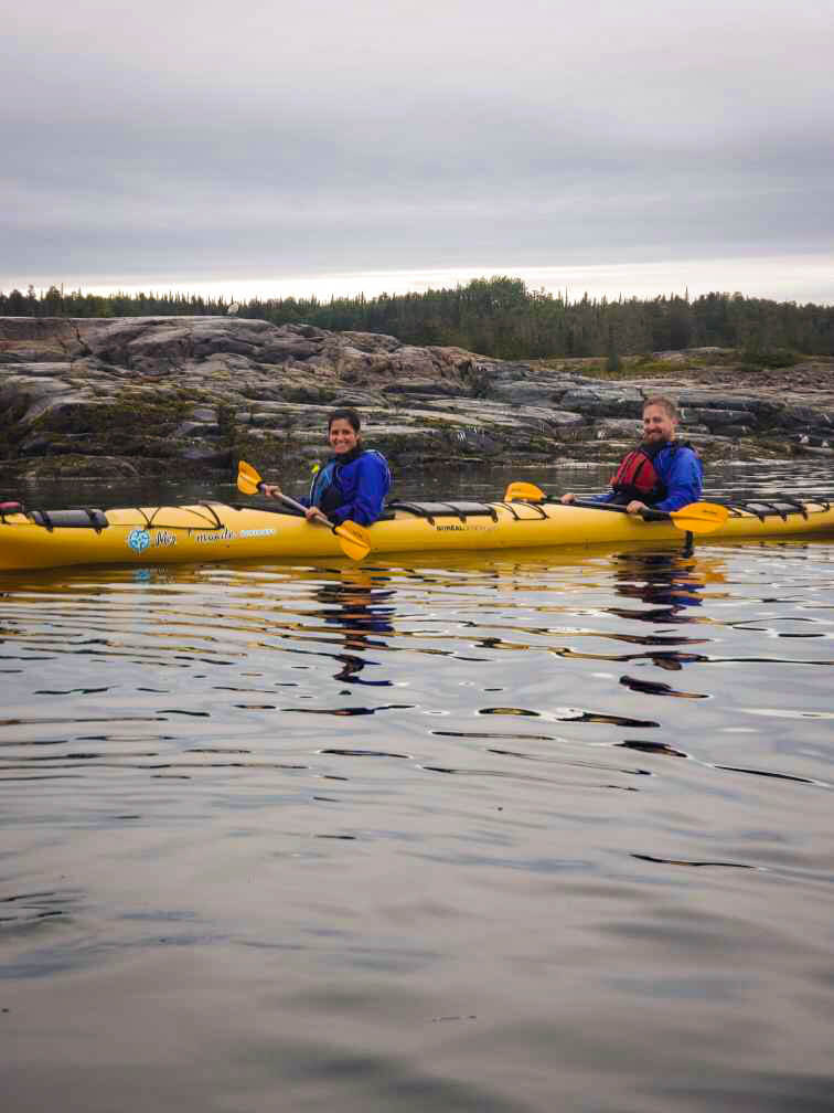 Kayaking with whales is one of the things to do in Tadoussac