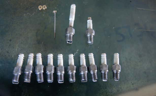 The components partially assembled. The metal bodies were heated with a gas flame until blue and dunked in old oil producing a black lustre