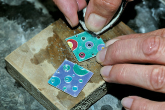 Grind with diagrit paper under water to expose the wires