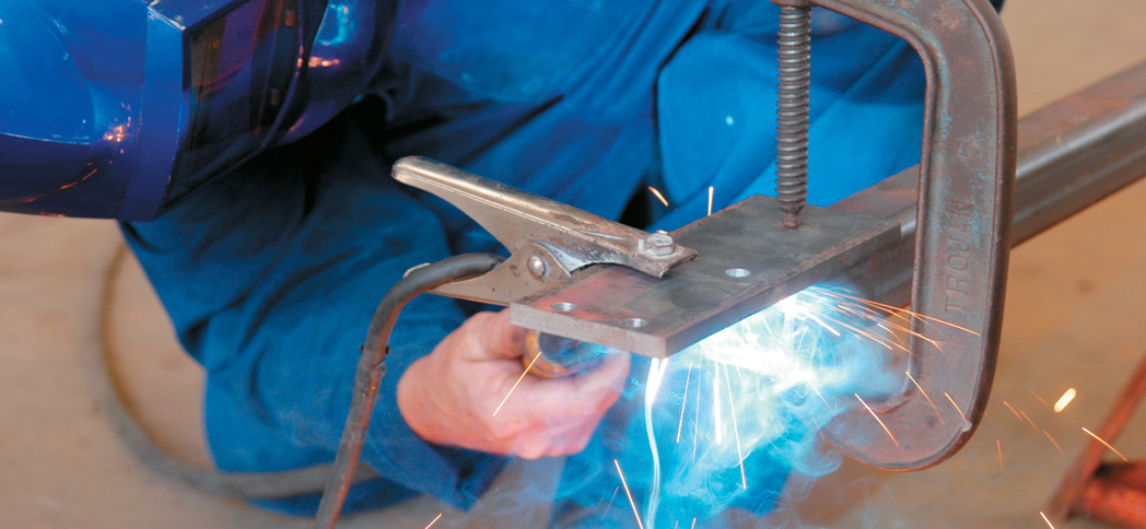 Coupling plate tack welded