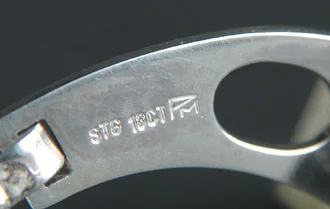 Maker's mark and carat alloy stamp