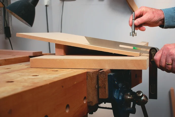 Simple drilling jig with a 7 degree angle on it. The angle on the bevel in the photo is 97 degrees