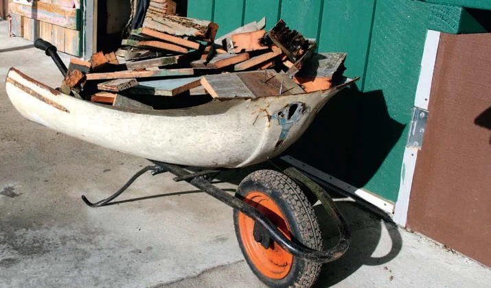 A car bonnet has a new lease of life as part of a wheelbarrow.