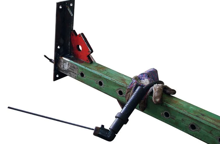 Brace the top plate with the gusset before full welding to prevent warping. The top plate bolts the sliding stanchion to the I-Beam