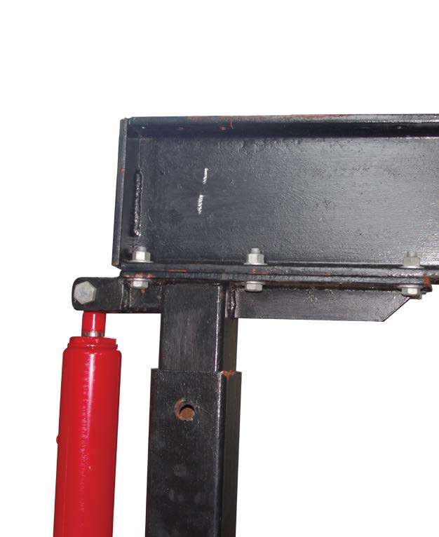 Detail of ttop plate bolted to I-Beam. Note gusset (right) and jack mount(left) welded to the plate and stanchion