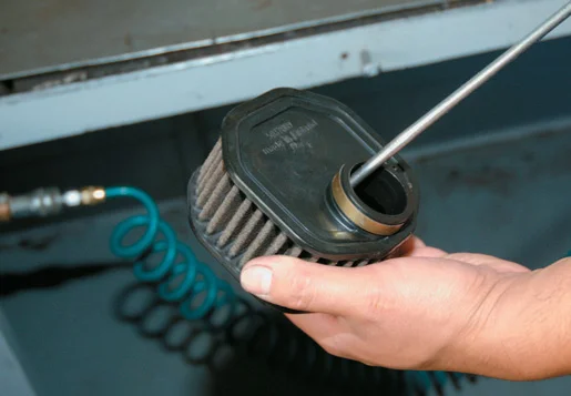 Blowing out the air filter