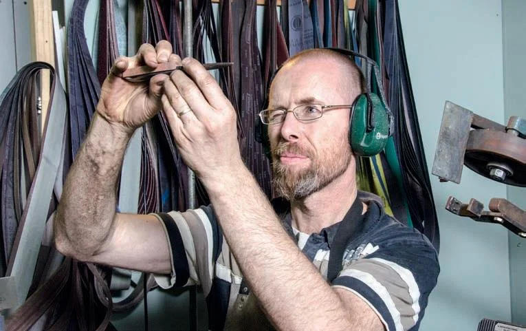 Checking the fit of the scales and bolster