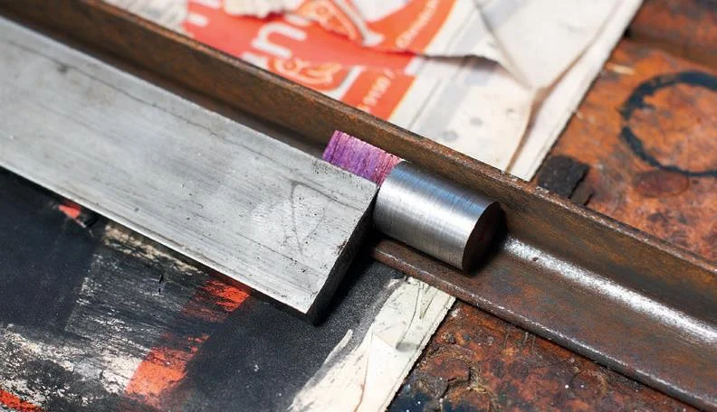 Preparing to weld the axles to the anvils. The positioning of the anvil is critical