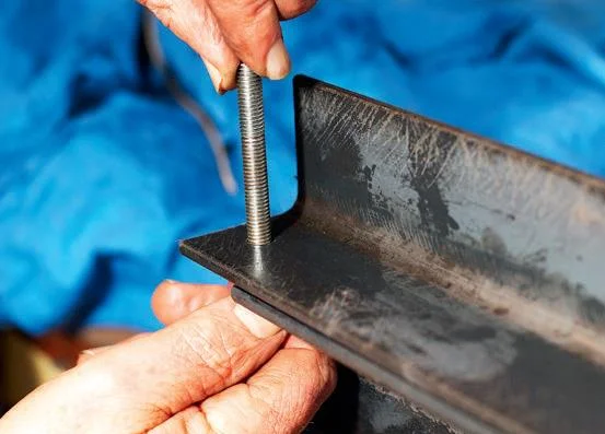 Clamping the bolt to fix it in place