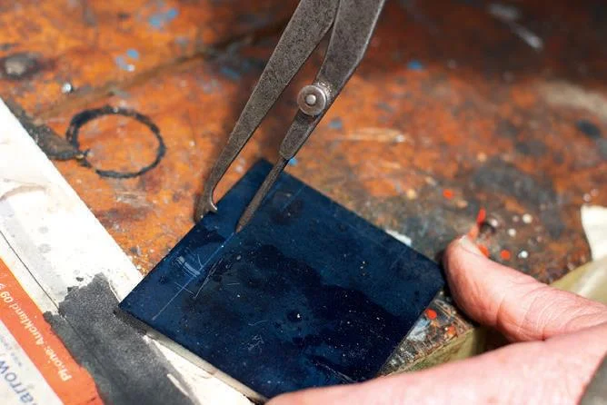 Marking out the end plate using oddlegs.