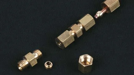 Steam outlet pipe uses union nut, nipple, olive and nut.