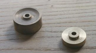 Flywheel (left) and crank wheel.