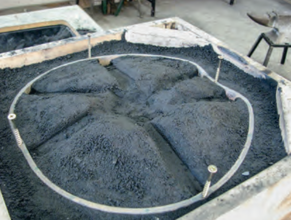 Motorguard mould in sand.