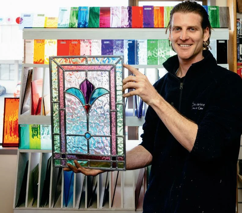 Myke with the completed leadlight panel.
