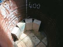 Fourth course of “soldier” fire bricks. Note vital 400 mm measurement.