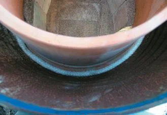 Fibreglass expansion rope between drum and pot.