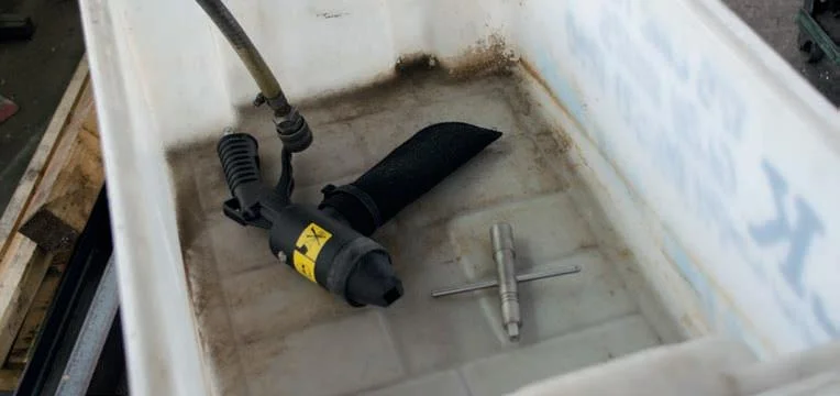 Working in a plastic fish bin in an attempt to contain the mess…