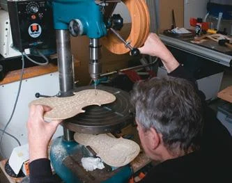 Drill holes help with wood removal.