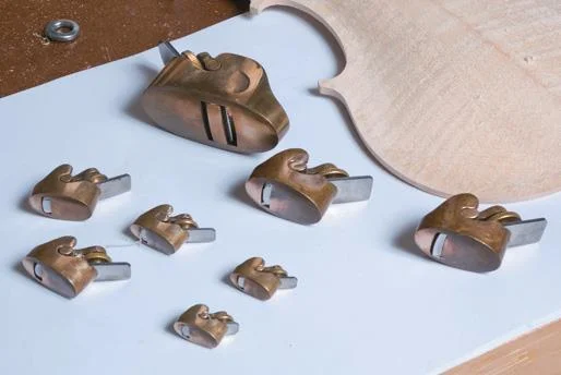 Thumb planes ( note toothed blade).