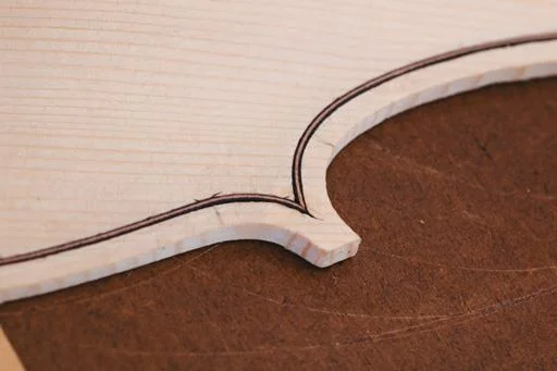 Purfling dry-fitted in corner.