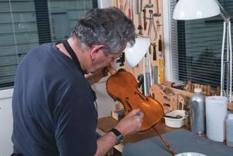 Applying varnish.