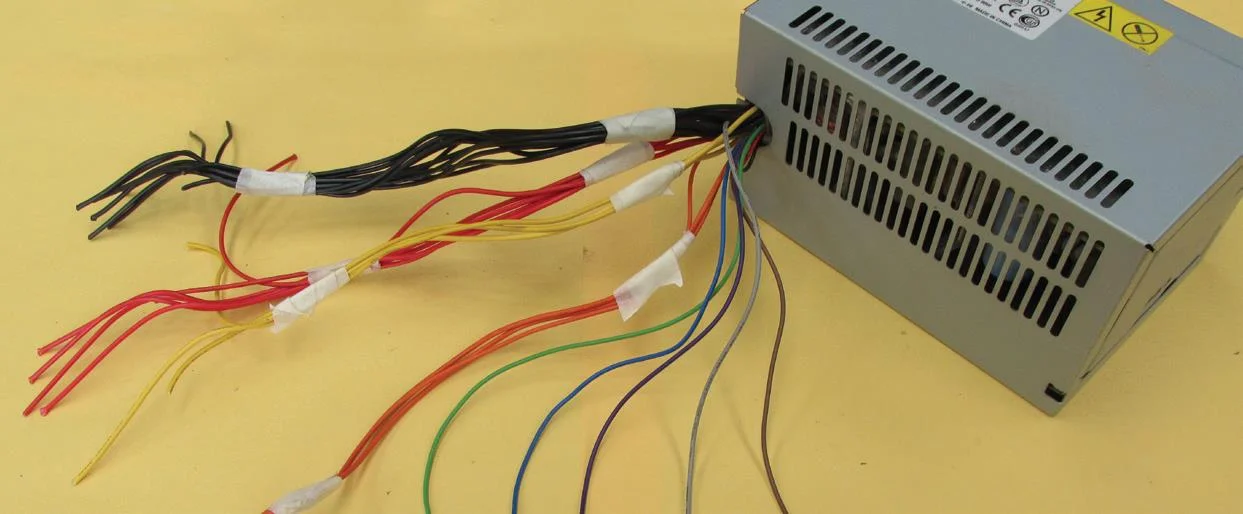 All the cables gathered together from the 90 watt: black, red, yellow, orange, blue, purple, green, grey, brown.