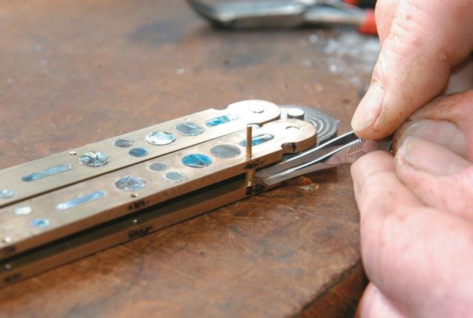 Insert spacers. Drop pins in