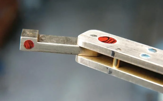 Red paua inlay in latch