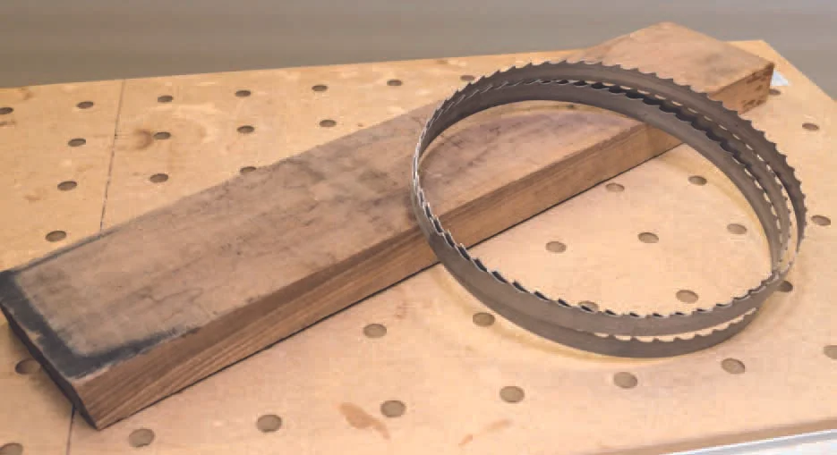 The piece of American walnut had been waiting in the storage shed for six years for this project to come along. Seen here with the resaw blade used to slice it in two