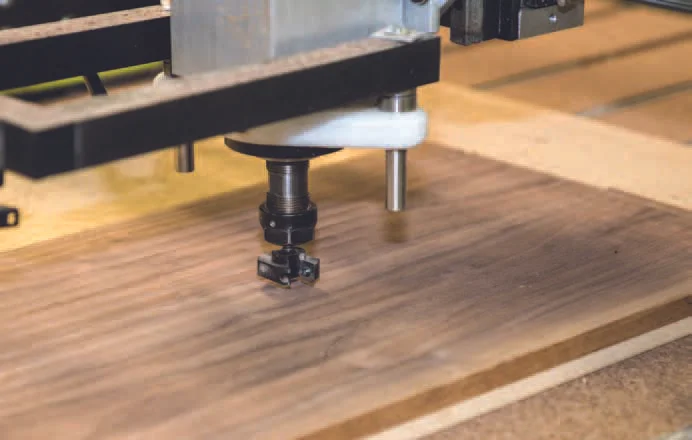 Flattening the joined panel using the surfacing cutter on the CNC router