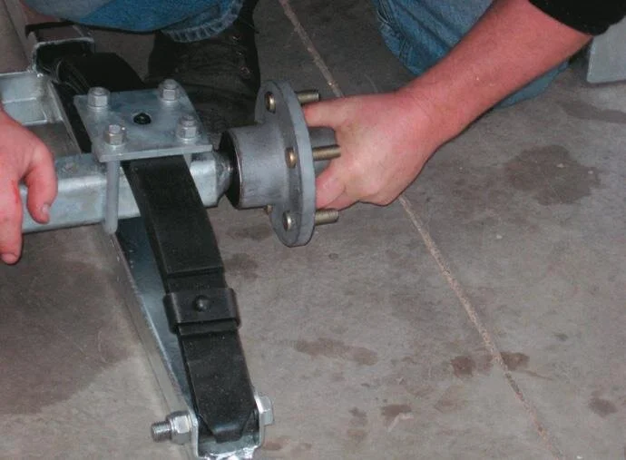 The springs, axle and hub bolted in place