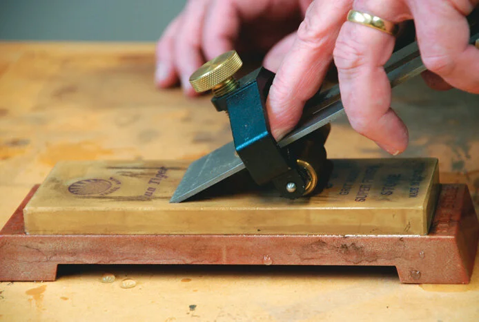 Honing the blade on a 6000 grade water stone