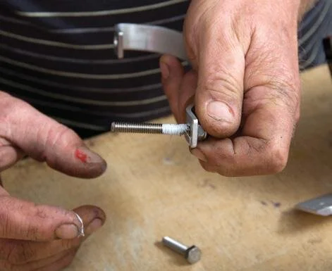 Urethane sealant on handle bolt