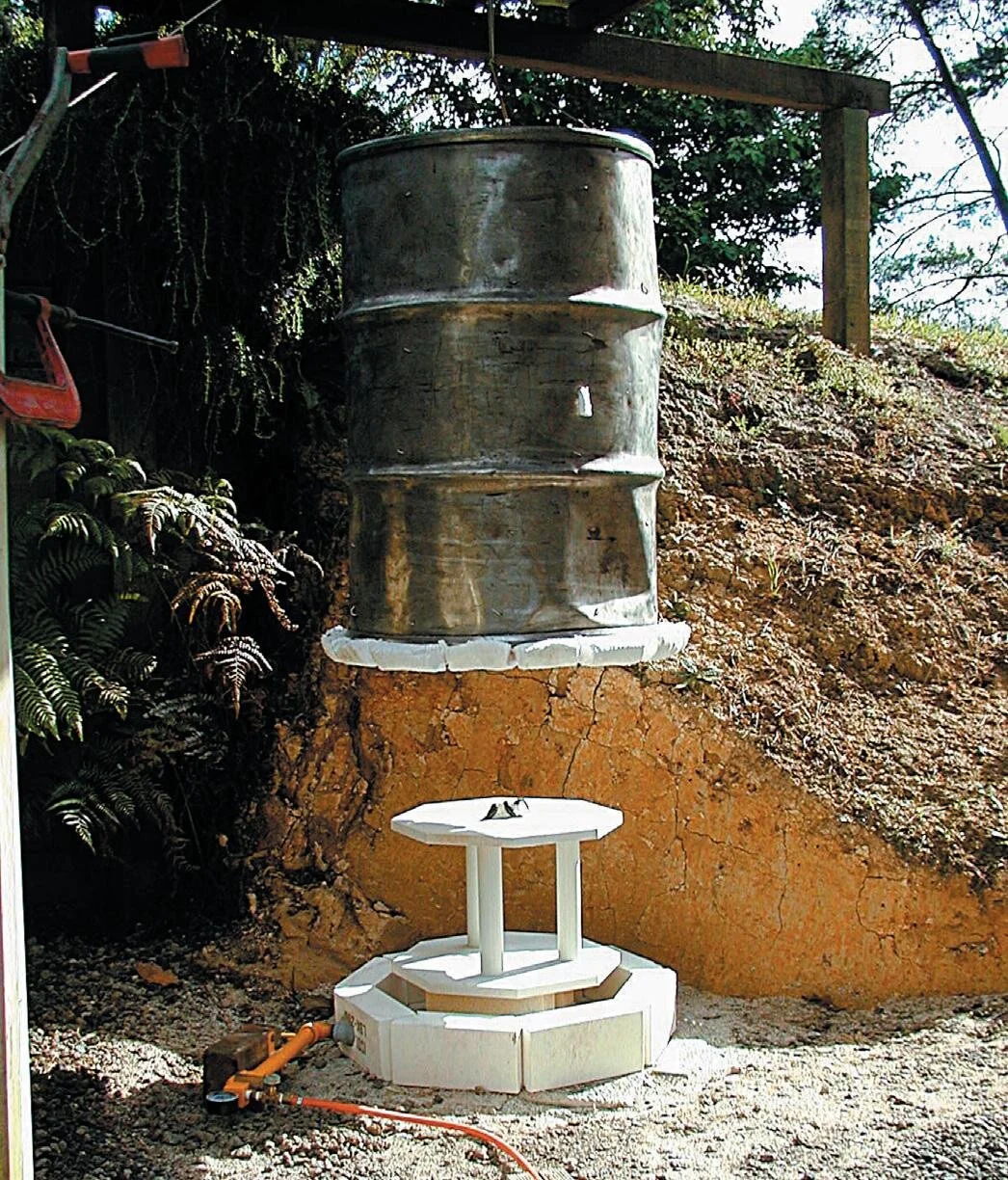 Kiln in up position with new ﬁrebricks base. Winch handle is just visible top-left