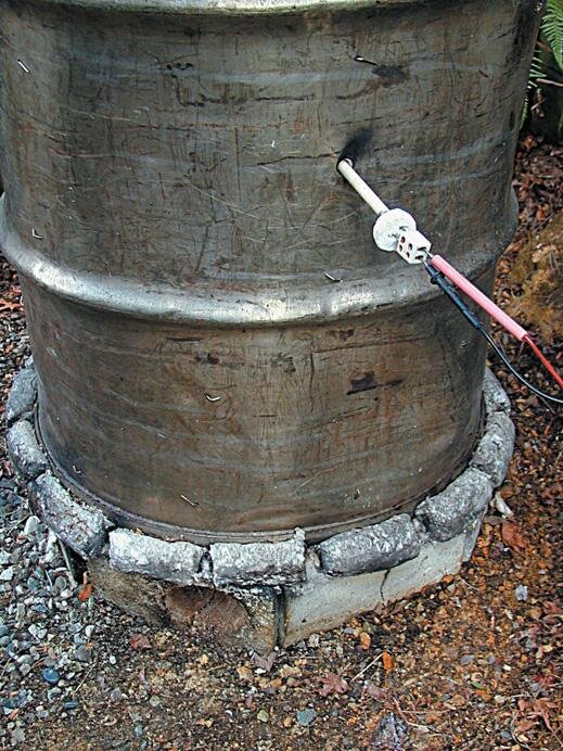 Thermocouple in sheath. Note ﬁrebrick button to help keep wires apart