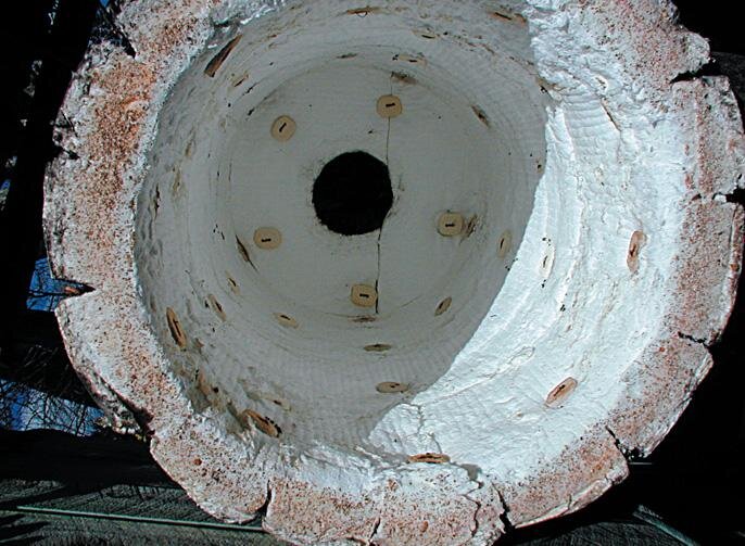 Ceramic ﬁbre blanket lining and button placement. The nichrome wires are almost burnt through after nine years