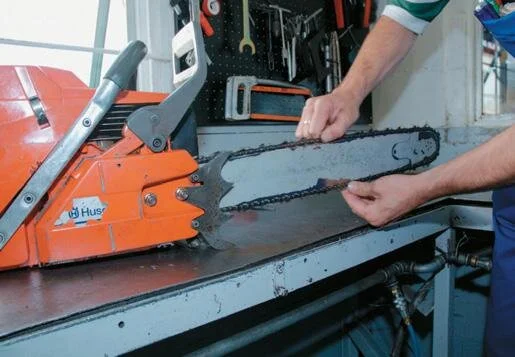 Checking the chain is on the sprockets and turning freely