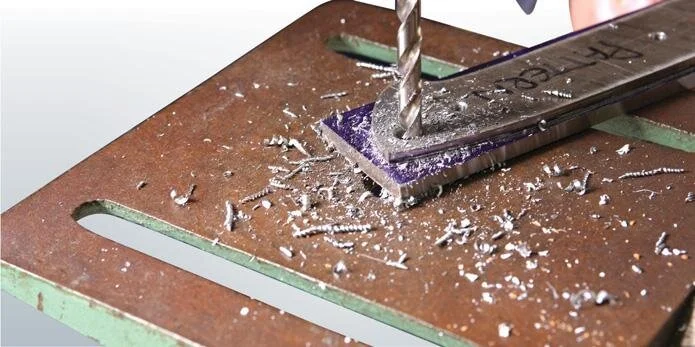 Leif drills holes…