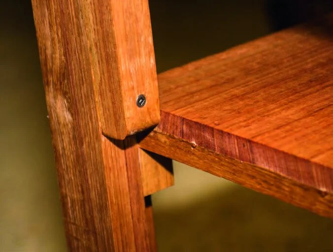 Wood block support for shelves.